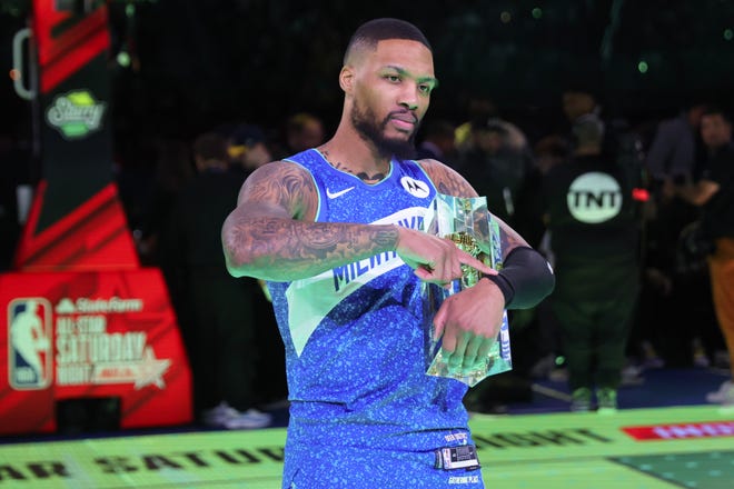 INDIANAPOLIS, INDIANA - FEBRUARY 17: Damian Lillard #0 of the Milwaukee Bucks celebrates after winning the 2024 Starry 3-Point Contest during the State Farm All-Star Saturday Night at Lucas Oil Stadium on February 17, 2024 in Indianapolis, Indiana. NOTE TO USER: User expressly acknowledges and agrees that, by downloading and or using this photograph, User is consenting to the terms and conditions of the Getty Images License Agreement. (Photo by Stacy Revere/Getty Images)