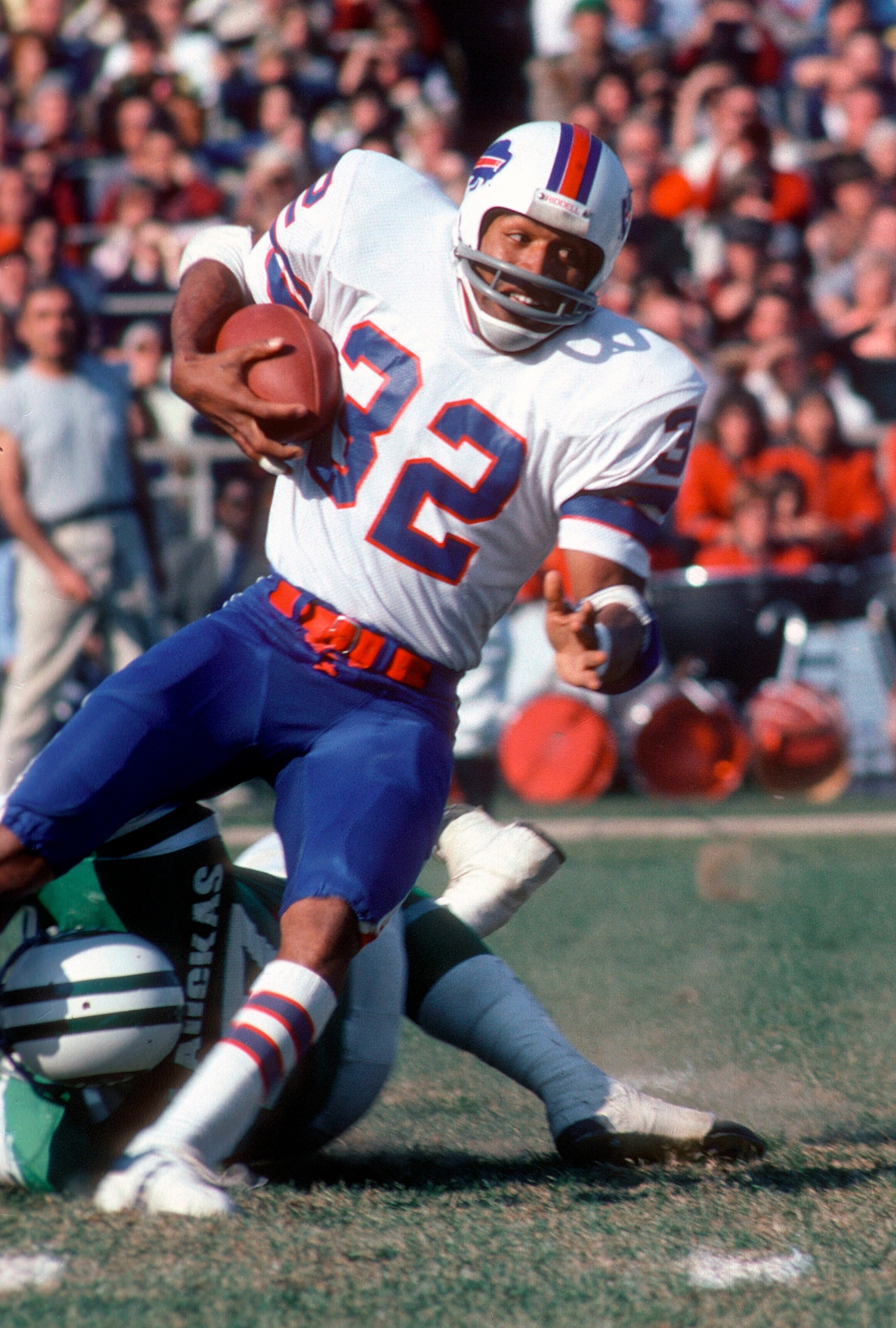 PHOTO: O.J. Simpson #32 of the University of Southern California Trojans looks on from the sidelines during an NCAA college football game circa 1968.