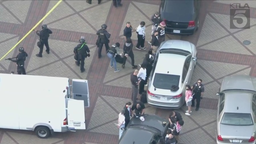 Dozens of demonstrators being detained and arrested during a pro-Palestinian protest at USC on April 24, 2024. (KTLA)