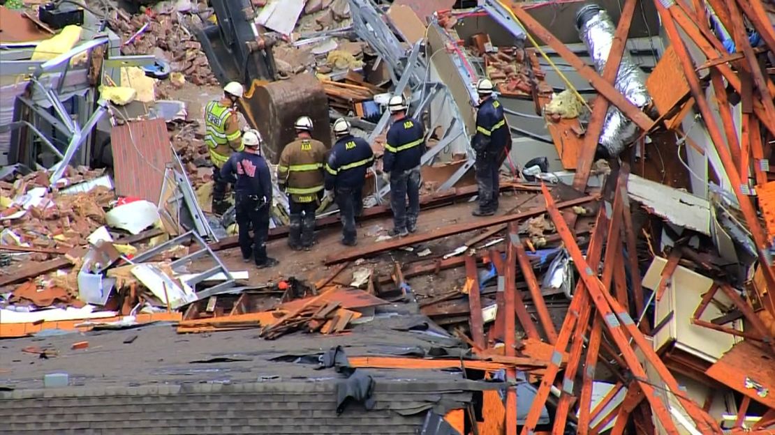 Emergency responders work in Sulphur, Oklahoma on April 28, following a tornado.