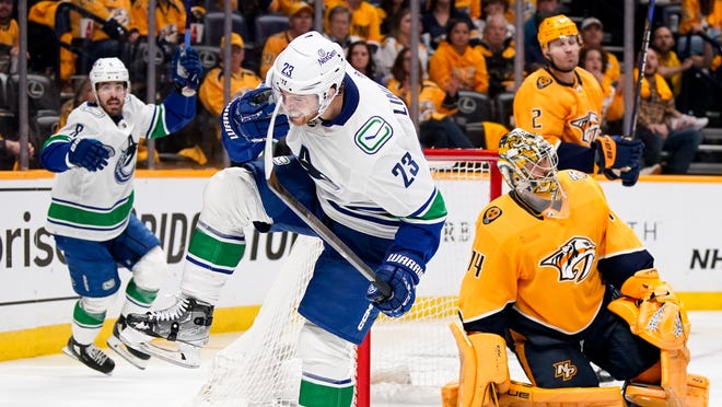 Canucks win Game 4 in OT, take 3-1 series lead over Predators