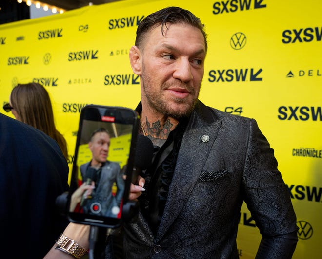 Conor McGregor speaks to press on the red carpet before the premiere of Road House at the Paramount Theatre in Austin, Texas on the first day of South by Southwest, Friday, March 8, 2024. McGregor plays the character