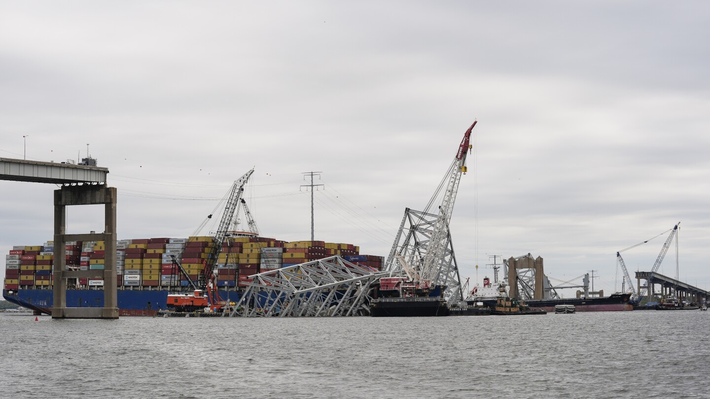 First cargo ship passes through newly opened channel in Baltimore