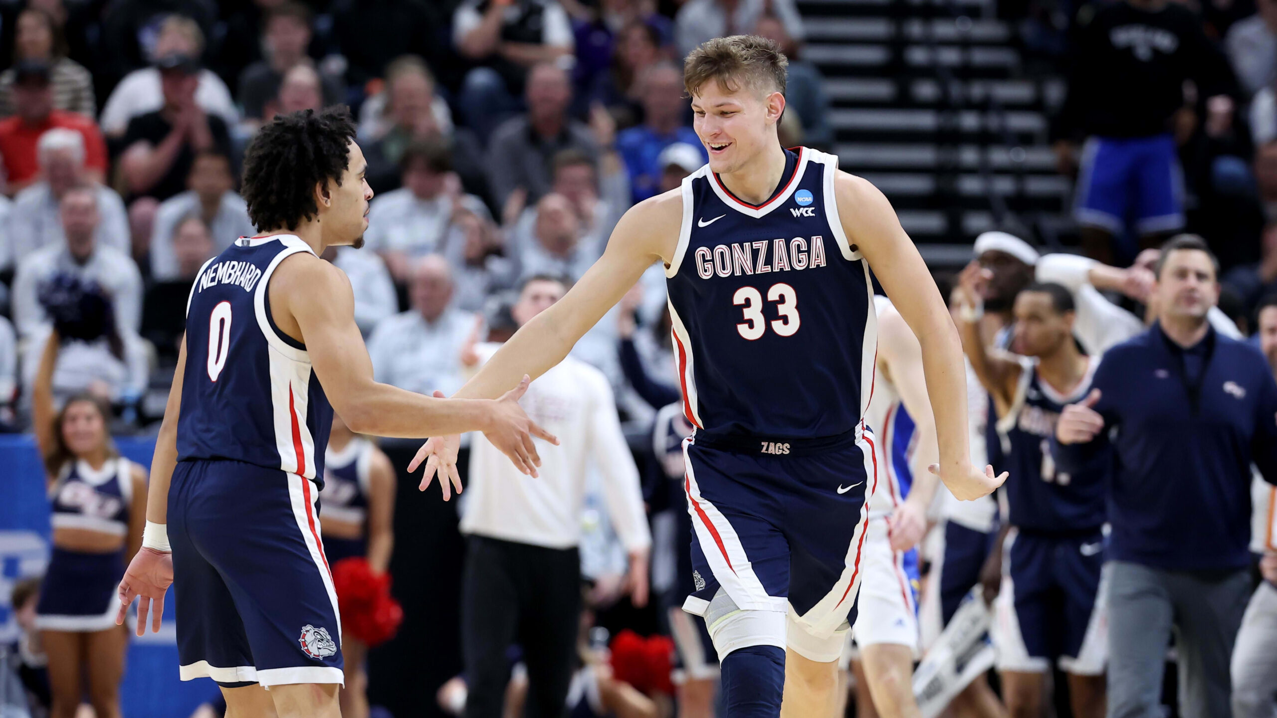 Mar 23, 2024; Salt Lake City, UT, USA; Gonzaga Bulldogs forward Ben Gregg (33) celebrates with guard Ryan Nembhard (0)