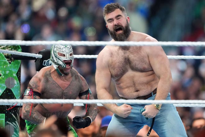 Apr 6, 2024; Philadelphia, PA, USA; Jason Kelce (right) appears during Rey Mysterio & Dragon Lee vs. Dominik Mysterio & Santos Escobar during Wrestlemania XL Saturday at Lincoln Financial Field. Mandatory Credit: Joe Camporeale-USA TODAY Sports