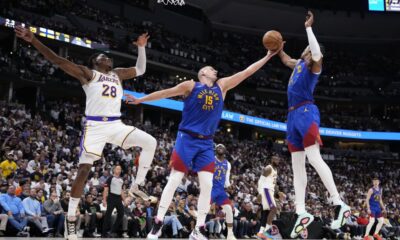 Nikola Jokic leads NBA champ Denver Nuggets past LeBron James and Lakers 114-103 in playoff opener