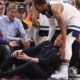 Wolves coach Chris Finch injures knee in sideline collision