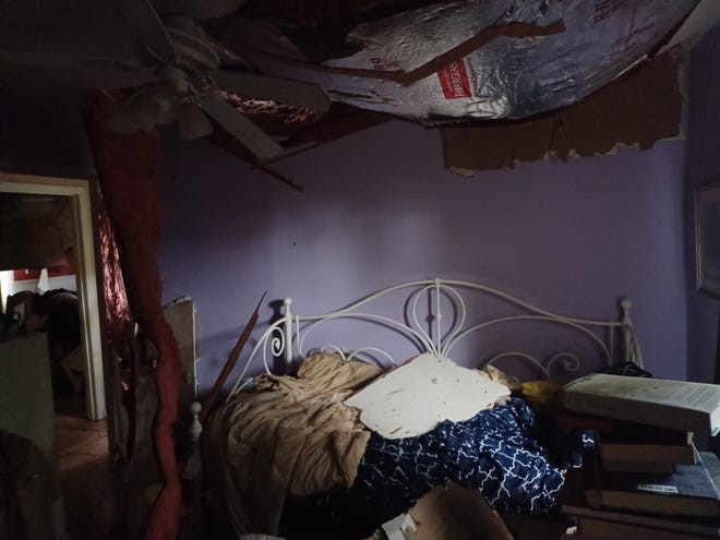 Thanks to a NWS texted tornado warning, the Martin family was sheltering in the central hallway when a pine crashed through all three bedrooms in the Indianhead-Lehigh neighborhood on Friday, May 10, 2024.