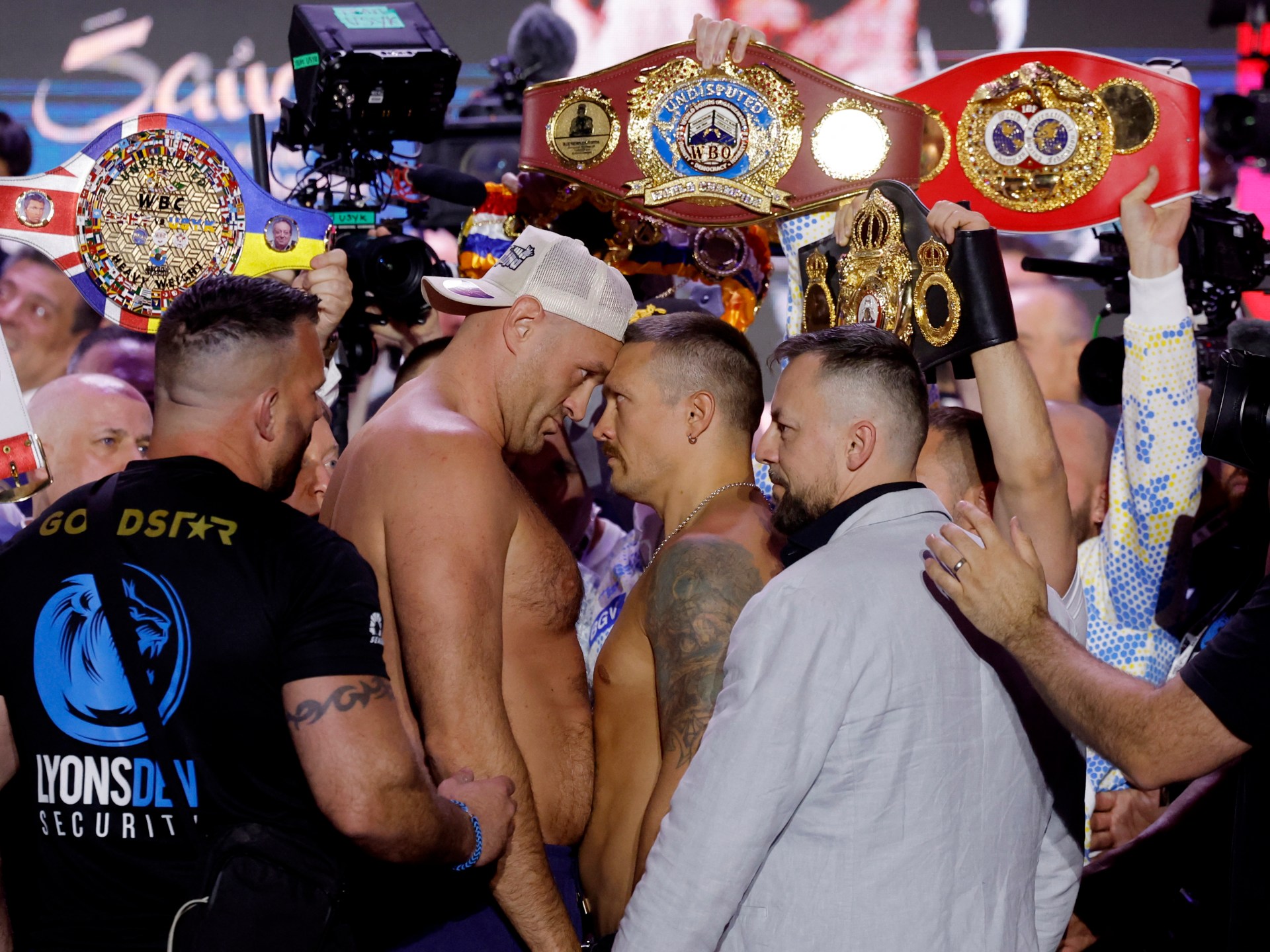 Tyson Fury vs Oleksandr Usyk: Foul-mouthed Fury shoves Usyk at weigh-in | Boxing News