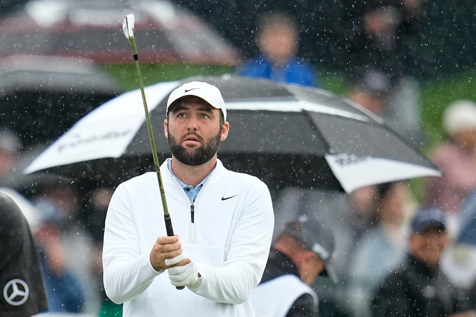 Scottie Scheffler warms up before the second round of the PGA Championship golf tournament at...