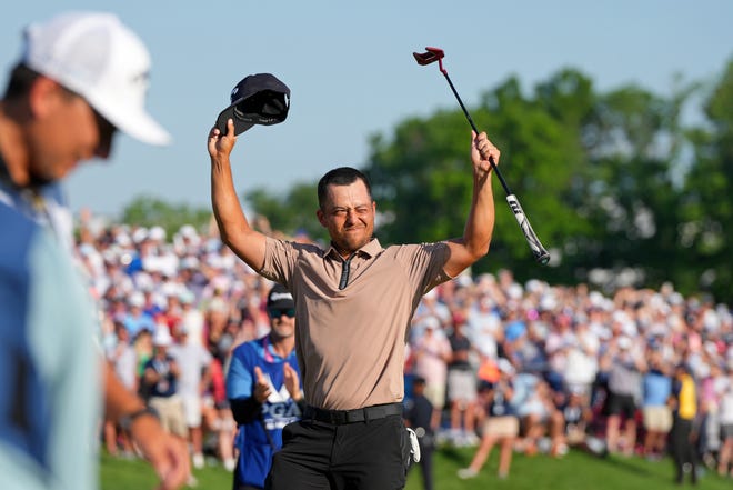 Xander Schauffele celebrates after winning the PGA Championship golf tournament at Valhalla Golf Club.