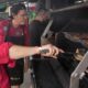 At the 'Super Bowl of Swine,' global barbecuing traditions are the wood-smoked flavor of the day