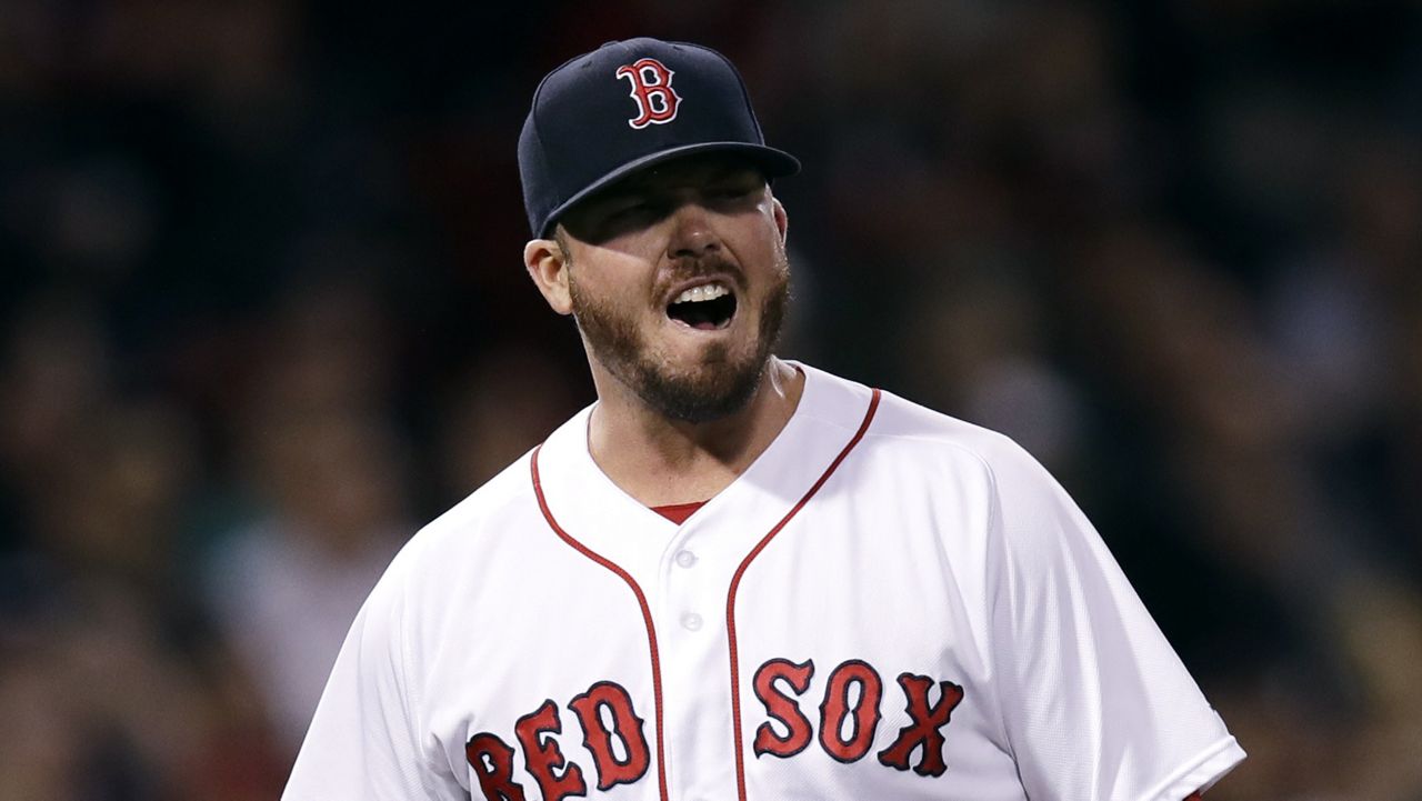 Boston Red Sox relief pitcher Austin Maddox reacts during the sixth inning of a baseball game at Fenway Park in Boston, Thursday, Sept. 28, 2017. (AP Photo/Charles Krupa, File)