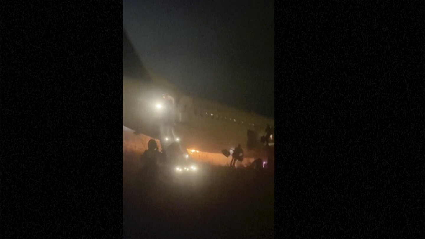 Boeing 737 catches fire and skids off the runway in Senegal, injuring 10 people