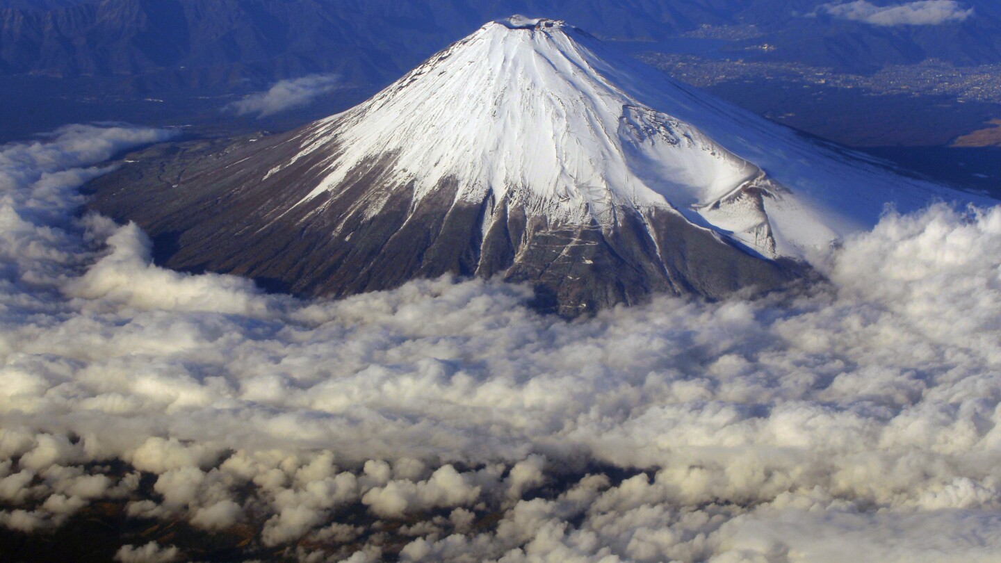 Climbing limits set on Mount Fuji to fight crowds, littering