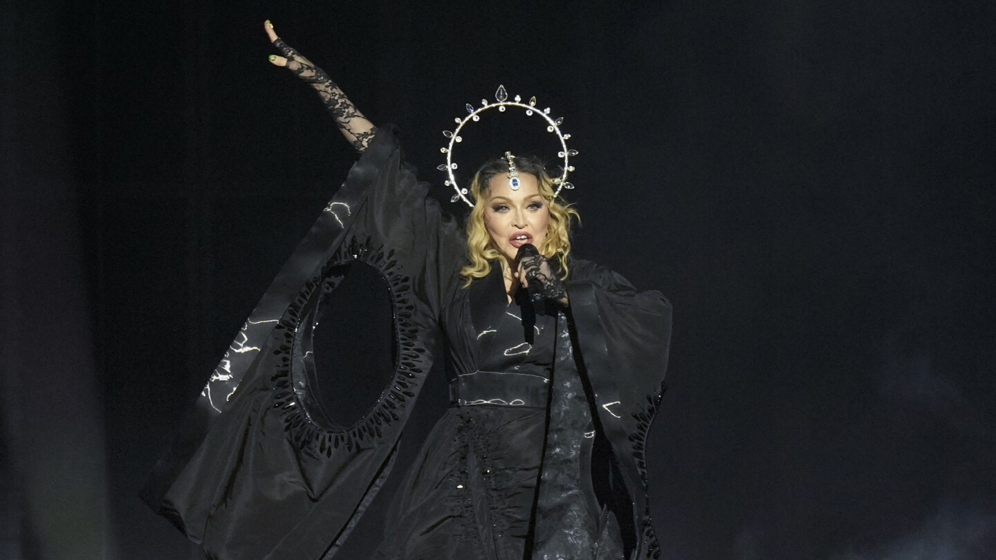 Madonna puts on free concert in Rio, turning Copacabana beach into enormous dance floor