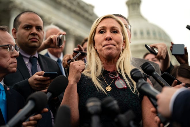 Rep. Marjorie Taylor Greene, R-Ga., answers the news media at the U.S. Capitol on May 8, 2024, the day the House of Representatives killed an effort to oust House Speaker Mike Johnson, R-La. The vote was 359-43.