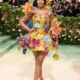 Nicki Minaj Puts On a Quirky Display in Canary Yellow Floral Appliqué Dress at the 2024 Met Gala