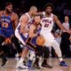 Apr 30, 2024; New York, New York, USA; New York Knicks guard Jalen Brunson (11) handles the ball against Philadelphia 76ers forward Nicolas Batum (40) and center Joel Embiid (21) during the first quarter of game 5 of the first round of the 2024 NBA playoffs at Madison Square Garden. Mandatory Credit: Brad Penner-USA TODAY Sports