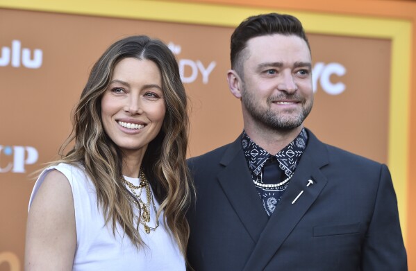 FILE - Cast member and executive producer Jessica Biel, left, arrives with her husband, Justin Timberlake, at the Los Angeles premiere of 