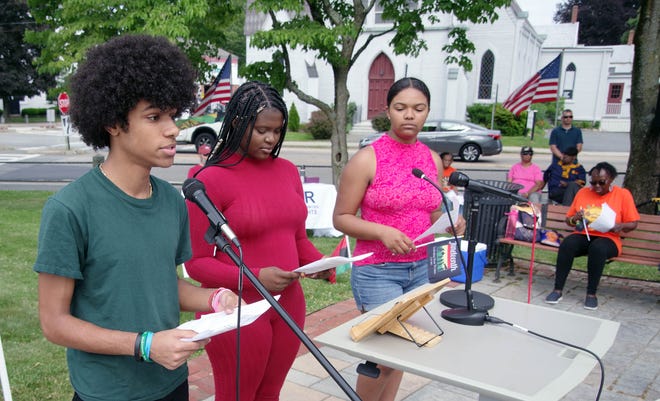 Speakers from Bridgewater-Raynham High School were invited to come to the Juneteenth Flag raising in downtown Bridgewater on Monday, June 17, 2024. Sharing their thoughts are Kendall Raymond, Aisha Alexis and Genisis Jilla.