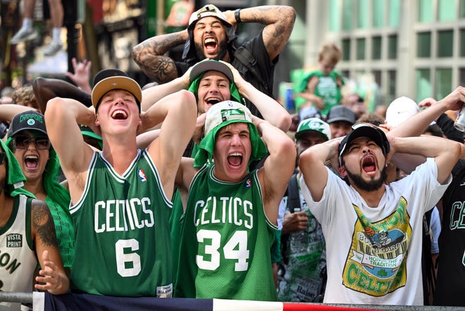 Jun 21, 2024; Boston, MA, USA; Fans cheer along Causeway Street before the Boston Celtics 2024 NBA Championship parade in Boston. Mandatory Credit: Brian Fluharty-USA TODAY Sports