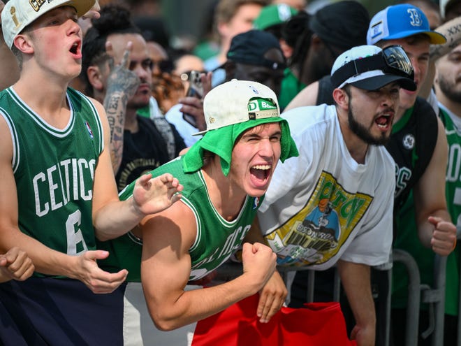 Jun 21, 2024; Boston, MA, USA; Fans cheer along Causeway Street before the Boston Celtics 2024 NBA Championship parade in Boston. Mandatory Credit: Brian Fluharty-USA TODAY Sports