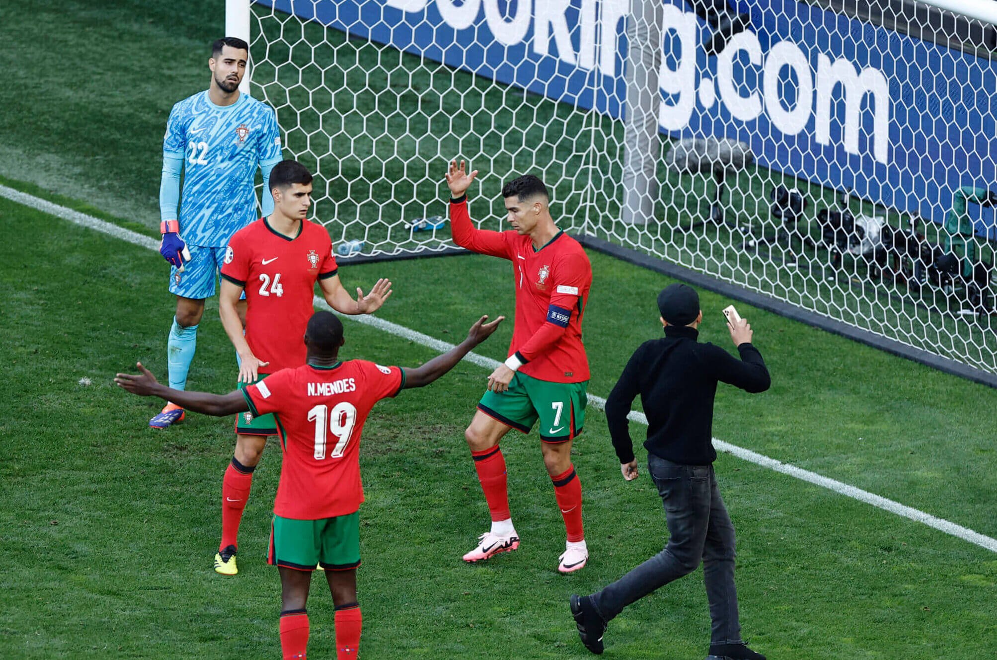 UEFA increases security after pitch invaders target Cristiano Ronaldo