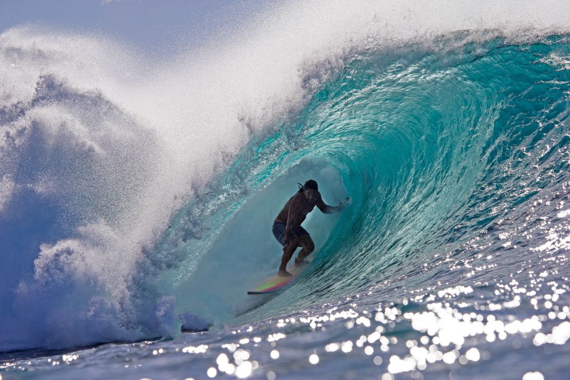 Perry's wife, Emilia Perry, credits him with helping her fine tune her surfing skills.