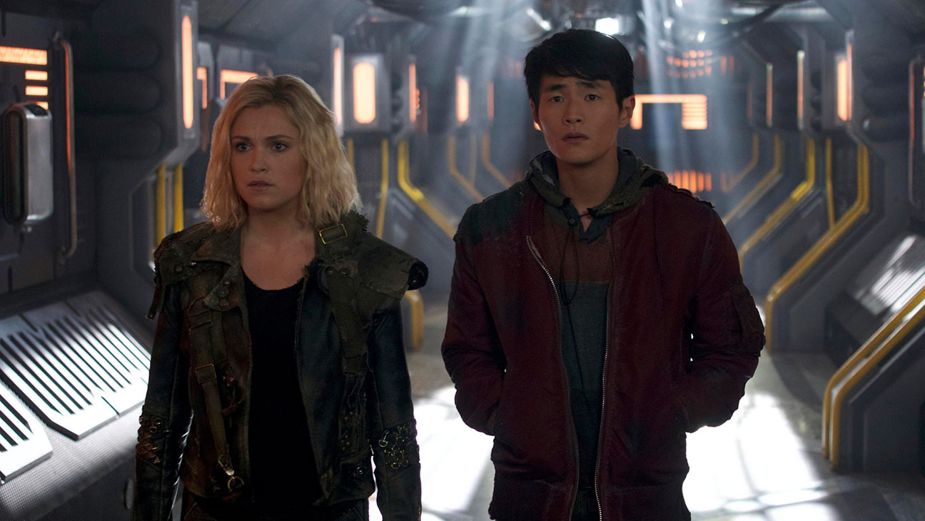 Eliza Taylor and Christopher Larkin in 'The 100.'