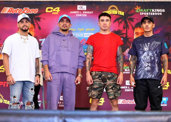 Teofimo Lopez (center left) and Steve Claggett (center right) stand with the stars of Saturday's co-main event, Robeisy Ramirez (far left) and Brandon Benitez (far right), ahead of their fights on Top Rank's card from Miami Beach.