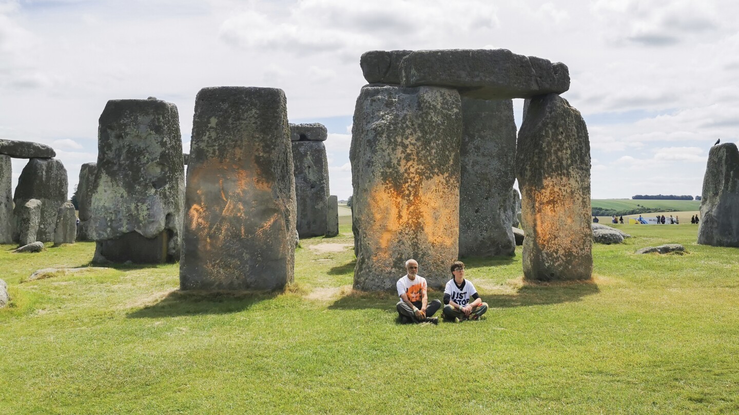 Climate protesters spray orange paint over Stonehenge