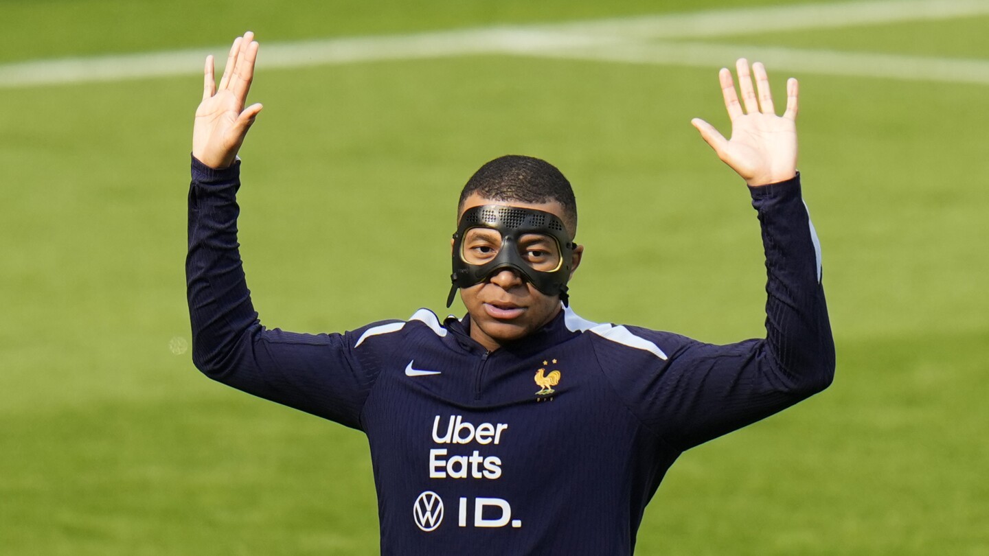 Mbappé getting used to new mask ahead of game against Poland, teammate says