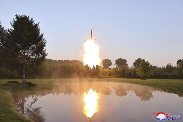 separation and guidance control test of individual mobile warheads at an undisclosed place in North Korea