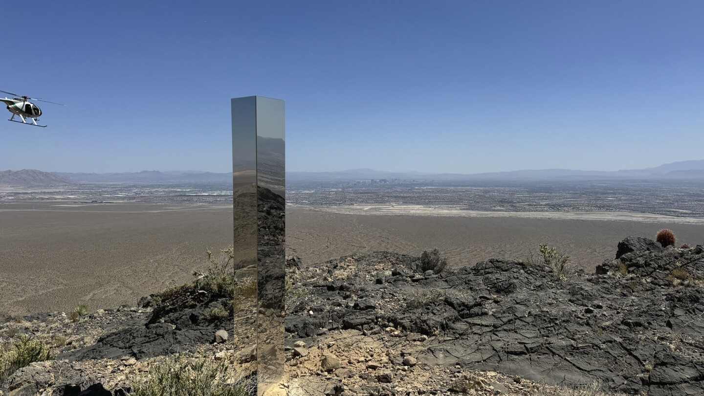 Shiny monolith removed from mountains outside Las Vegas. How it got there still is a mystery