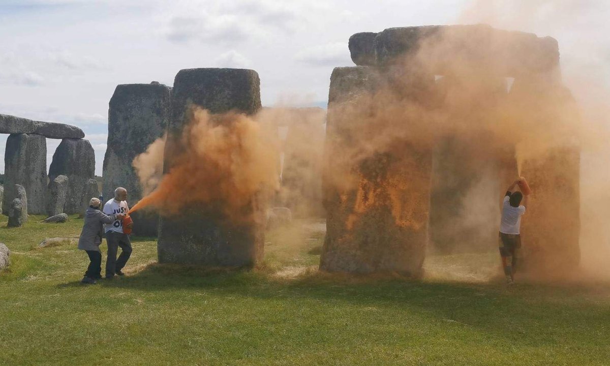 Two eco-activists arrested after Stonehenge sprayed with orange powder