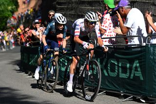 Tadej Pogačar and Jonas Vinegegaard battling it out on the San Luca climb