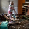 A resident of Fort Myers, Fla., surveys damage after Hurricane Ian in 2022.