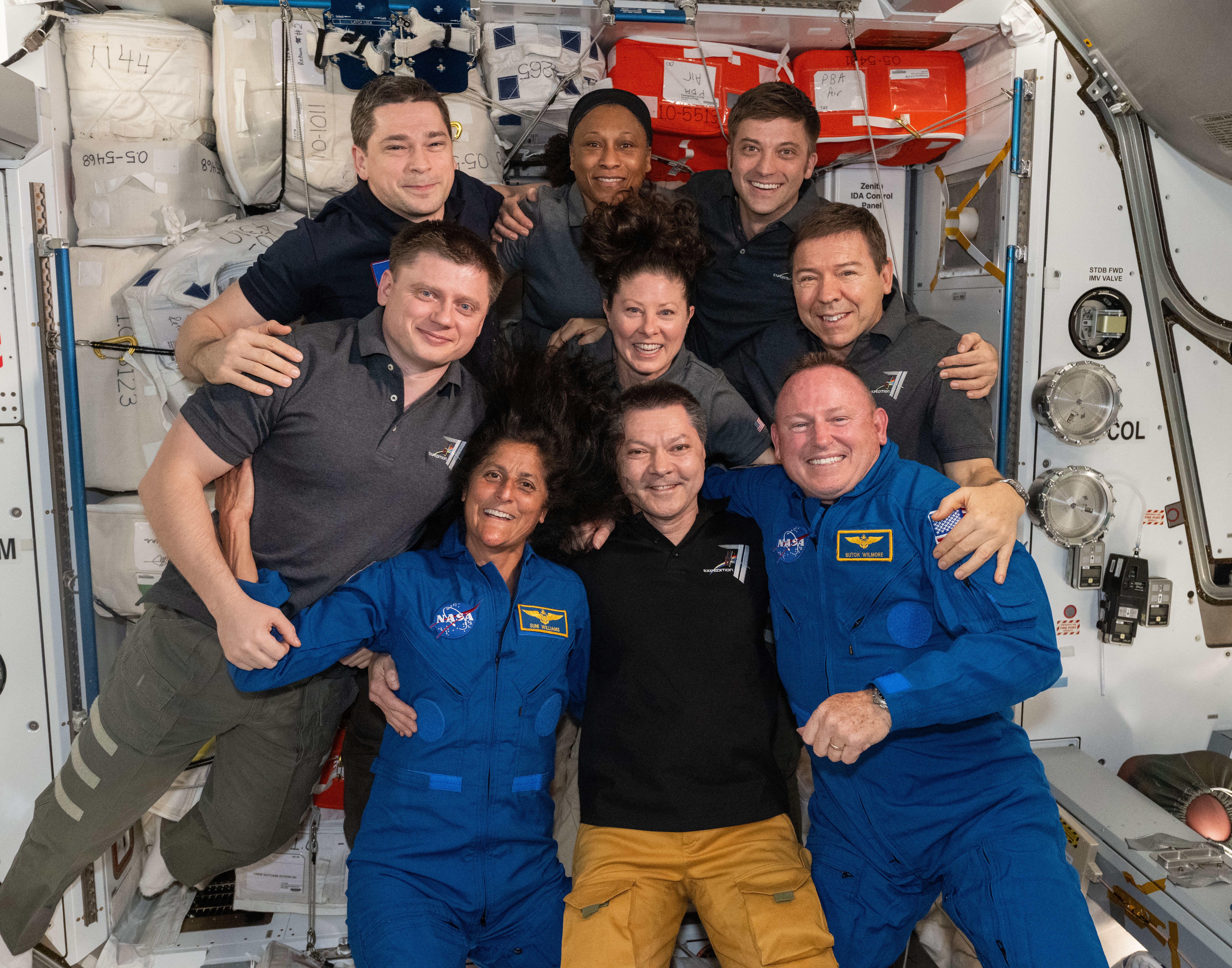 July 4, 2023. Expedition 69 NASA astronauts Francisco “Frank” C. Rubio, left, Stephen G. Bowen, and Warren W. “Woody” Hoburg send an Independence Day greeting