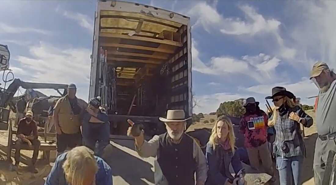 Alec Baldwin gestures while talking with investigators following the fatal on-set shooting that killed cinematographer Halyna Hutchins in October 2021. Video of the conversation was released by the Santa Fe County Sheriff's Office in 2022.