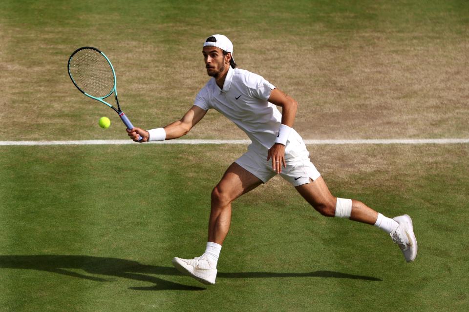 Lorenzo Musetti in action against Novak Djokovic (Getty Images)