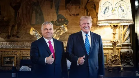 Reuters Viktor Orbán and Donald Trump at Mar-a-Lago