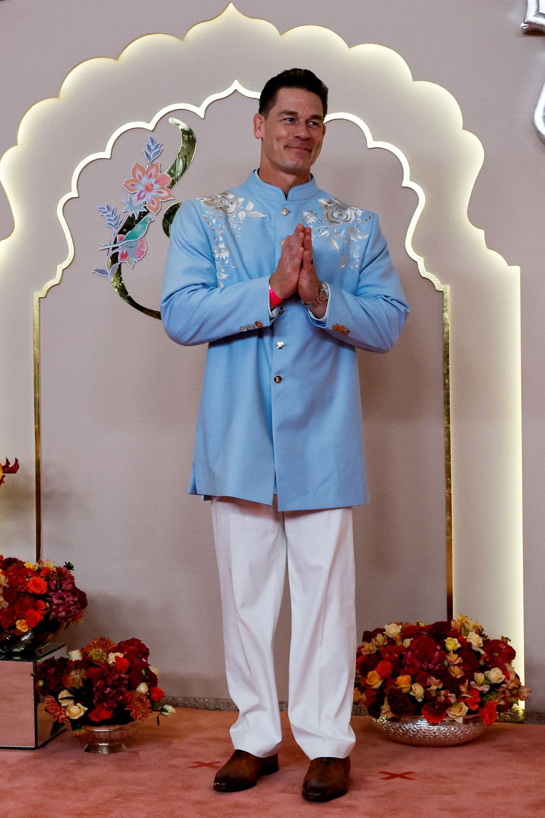 John Cena arrived in an embroidered blue sherwani.