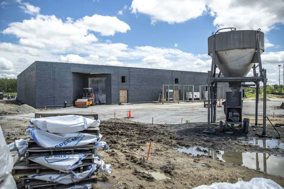 Construction continues July 8 on the Linn-Mar Community School District administration building, which is part of a five-year facilities plan, in Marion. Other parts of the plan include a larger performance venue and an indoor athletic center for the high school. (Geoff Stellfox/The Gazette)