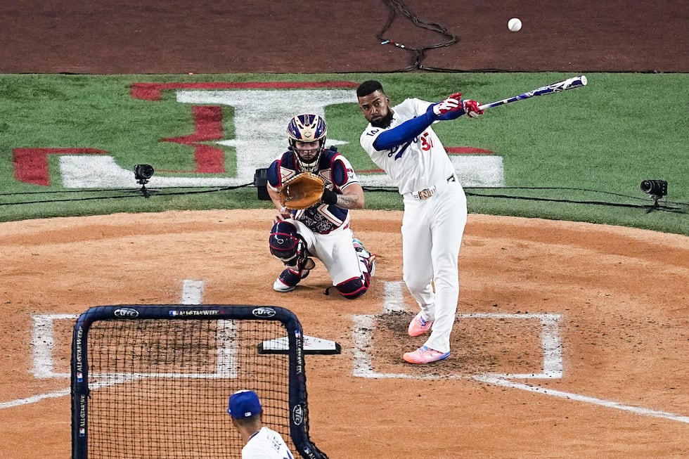 Teoscar Hernandez, of Los Angeles Dodgers, hits a home run during the semifinal round of the...