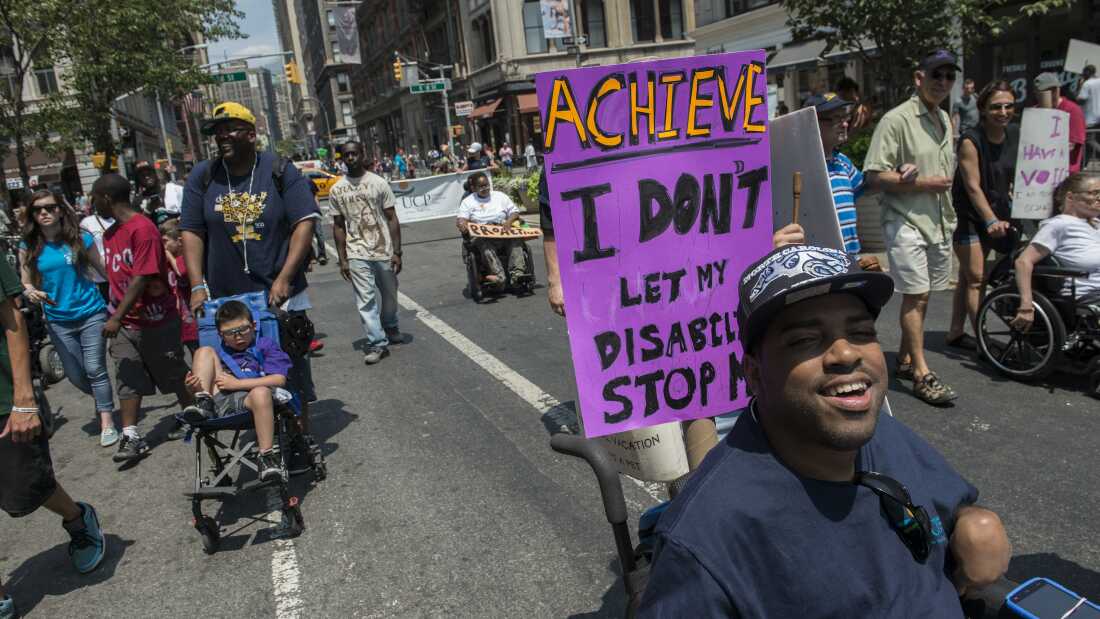 People participate in the first annual Disability Pride Parade on July 12, 2015 in New York City.