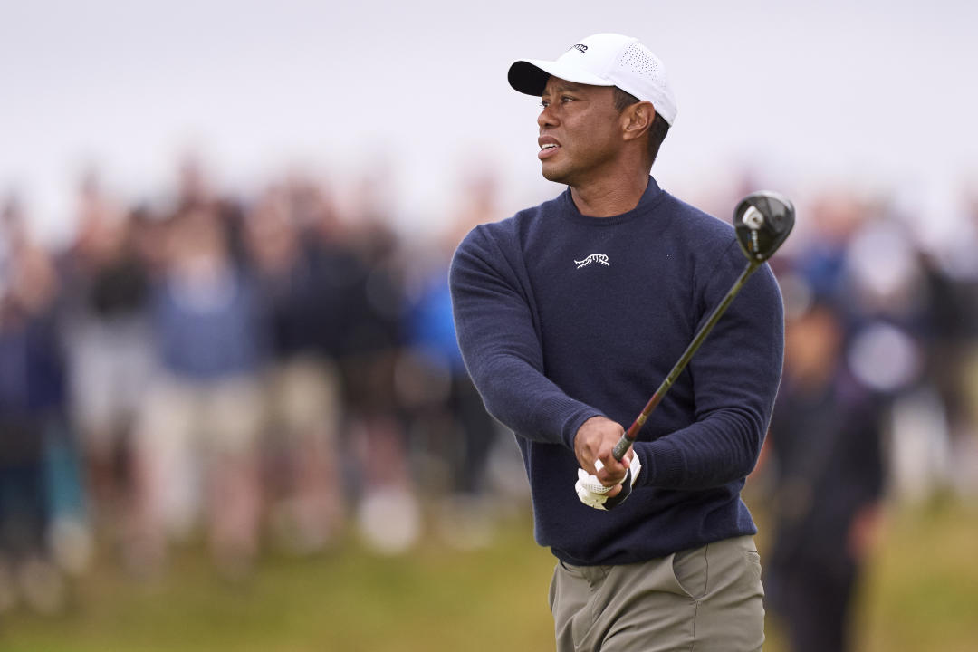 TROON, SCOTLAND - JULY 19: Tiger Woods of United States plays his second shot on the 4th hole on day two of The 152nd Open championship at Royal Troon on July 19, 2024 in Troon, Scotland. (Photo by Pedro Salado/Getty Images)