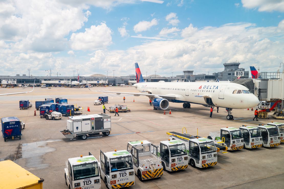 A delayed Delta Airlines plane sits on the tarmac at the Hartsfield-Jackson Atlanta International Airport on July 23, 2024 in Atlanta, Georgia.