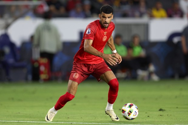 AFC Bournemouth forward Dominic Solanke looks to pass the ball...