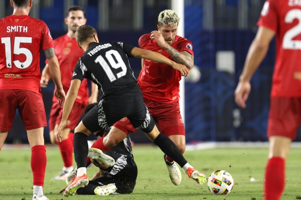 AFC Bournemouth defender Marcos Senesi, right back, vies for the...